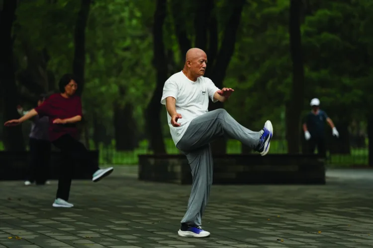 Tai chi practitioners seek balance and well-being in fast-paced Beijing